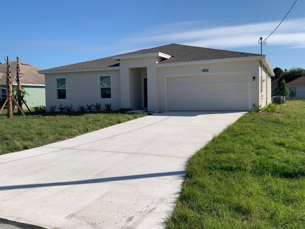 Photo of 5420 NW Bolin Street, Port Saint Lucie, FL 34953 (MLS # R10771980)