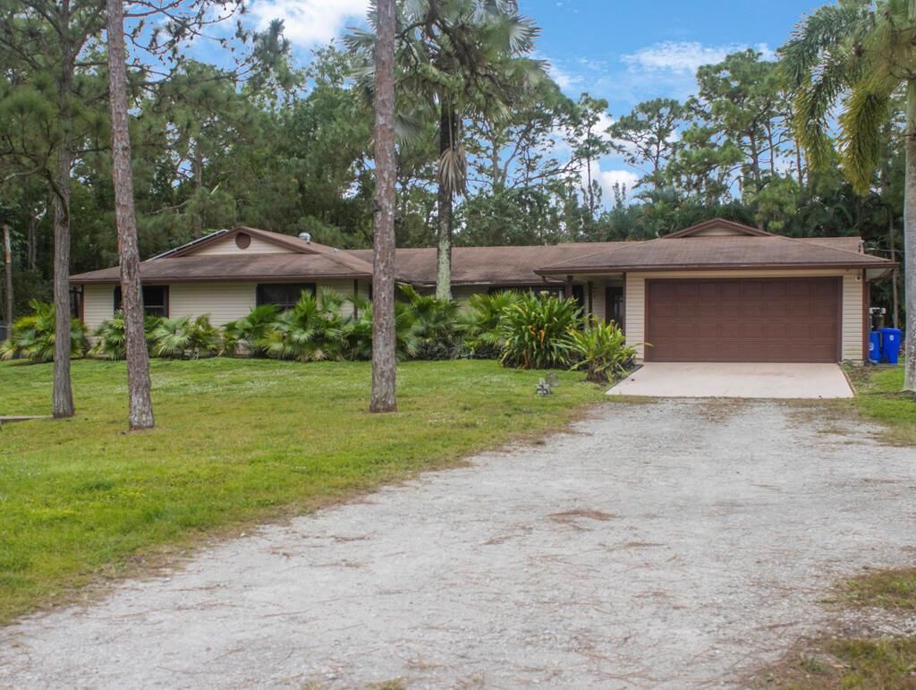 Photo of 12356 61st Lane N, West Palm Beach, FL 33412 (MLS # R11052948)