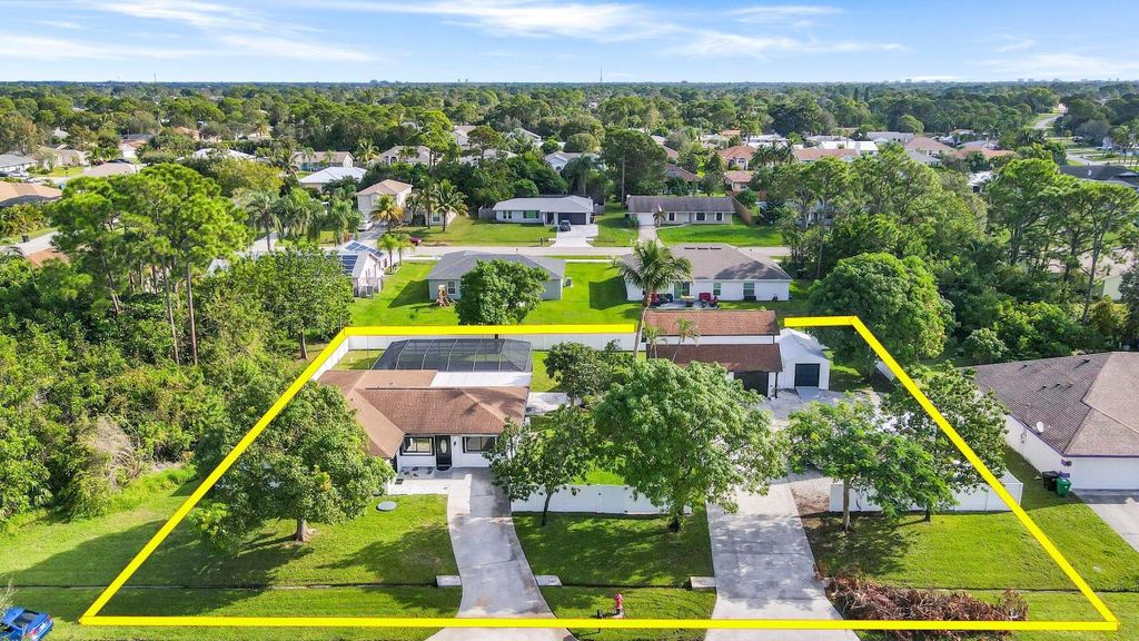 Photo of 1665 SE Harp Lane, Port Saint Lucie, FL 34983 (MLS # R11153128)