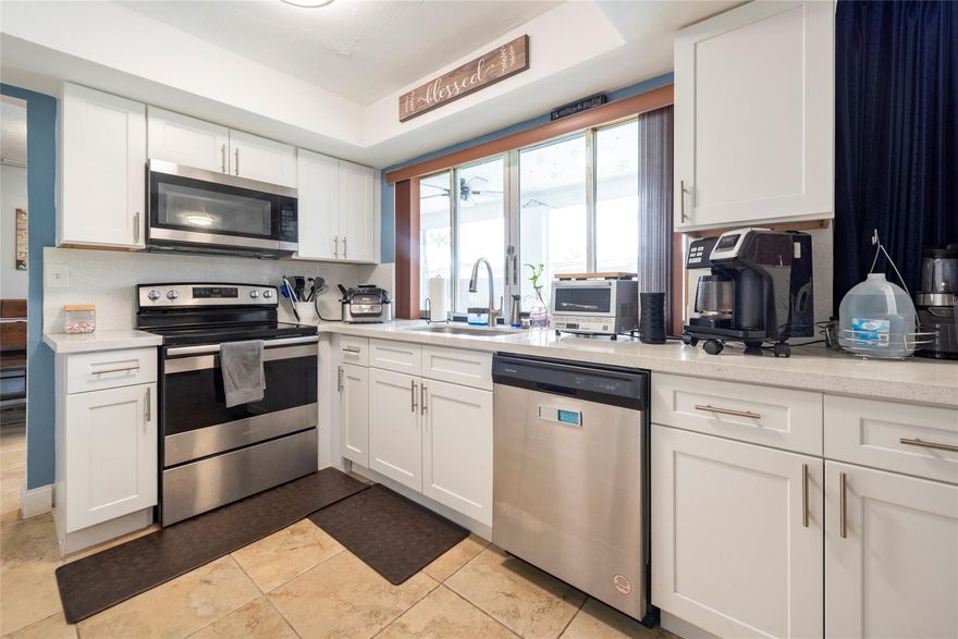 **Just Reduced!** BEAUTIFUL 3/2 HOME IN THE HEART OF SUNRISE. OPEN SPACIOUS SPLIT BEDROOM PLAN. SUNKEN LIVING ROOM. LARGE FAMILY ROOM NEXT TO UPGRADED KITCHEN QUARTZ COUNTER TOPS AND BACKSPLASH. 3YRS NEW STAINLESS STEEL APPLIANCES, NEWISH LAMINATED FLOORS. NEW 3YRS WASHER/DRYER AND WATERHEATER. NEW AC 3YRS, NEW ROOF 2024 NEW FASIA 2024. SPARKLING REFRESHING POOL AND 2YRS NEW SCREENED PATIO. AMPLE BACK YARD GREAT FOR BBQS, PETS, AND ENTERTAINING.  NEW MASTER BATHROOM CEILING LIGHT WITH  BRIGHT COLORS. NEW PATIO CEILING FANS 2YRS. NEW VANITY AND TOLIET GUEST BATHROOM. LED LIGHTS, 2YRS NEW ELECTRICAL PANEL.  CLOSE TO MIDDLE SCHOOL, SHOPPING, RESTURANTS, ENTERTAINMENT, MAJOR ROADWAYS AND MORE. NO HOA.