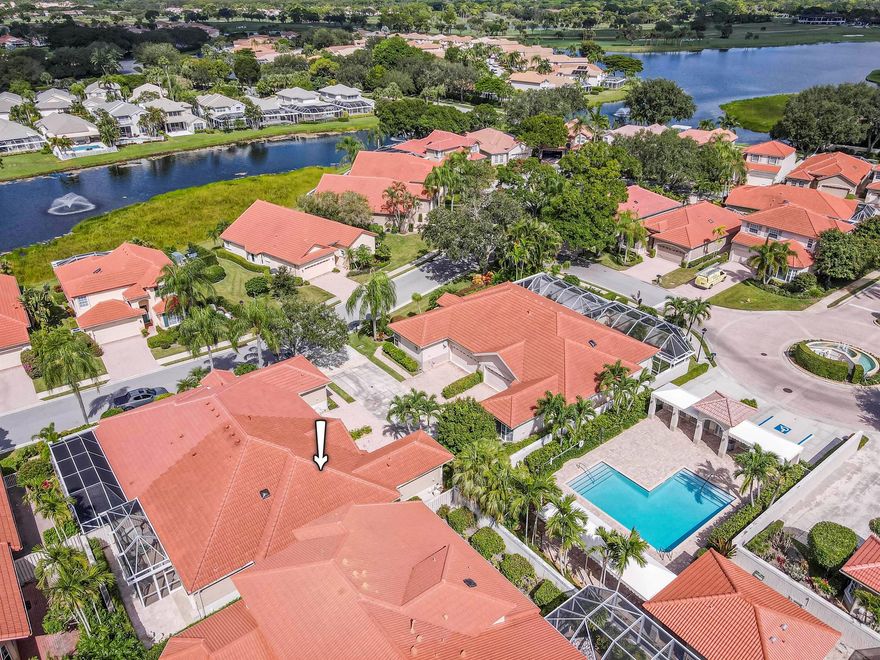 This bright and airy one-story CBS townhouse offers 3 bedrooms and 2 bathrooms within 1,620 sq ft of living space in the desirable Monterey Pointe subdivision of PGA National, Palm Beach Gardens. A soft neutral palette and light stone-look tile flow throughout the home, creating a welcoming and seamless ambiance. The spacious living room provides ample seating and entertainment space, enhanced by three plantation-shuttered windows and recessed lighting. Adjacent, the cozy dining room is bathed in natural light from a large skylight, ideal for intimate dinners or gatherings. The kitchen features ivory wood cabinetry with coordinating granite countertops and backsplash, a stainless-steel appliance package including a gas range, and an island snack bar with additional seating.