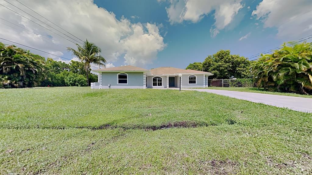 Photo of 2961 SE Lander Avenue, Port Saint Lucie, FL 34952 (MLS # R10744582)