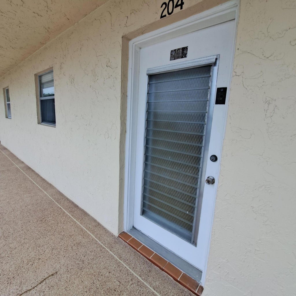 Photo of 204 Oxford 500, West Palm Beach, FL 33417 (MLS # R11031925)