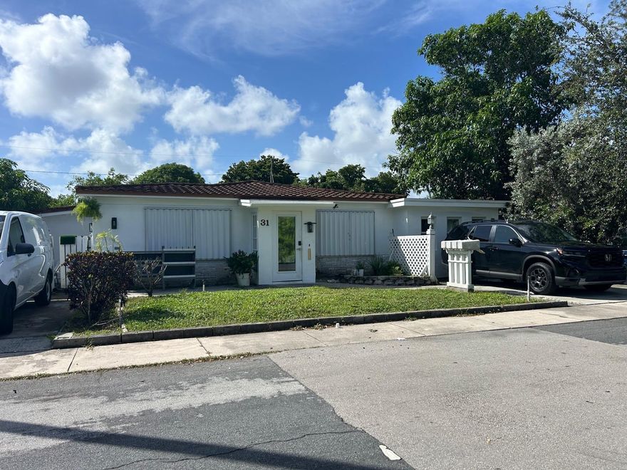 Welcome to this charming and cozy 1-bedroom unit in the heart of Dania Beach—rapid approvals! Featuring an open layout this home offers a comfortable living space with ceiling fans and a wall unit for your convenience. Enjoy a shared front patio and sitting area, perfect for relaxing outdoors, plus designated parking located in the rear alley.
Just under 2 miles from the beach and airport, this home sits in a peaceful neighborhood that combines convenience with tranquility.