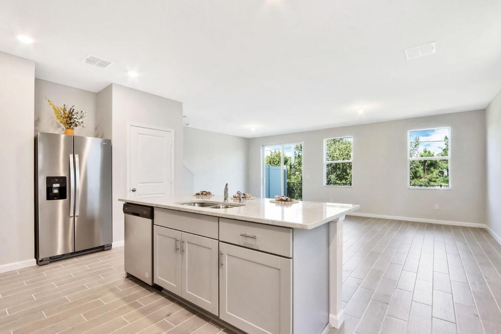 Photo of 188 Osprey Preserve Boulevard, Jensen Beach, FL 34957 (MLS # R10933646)