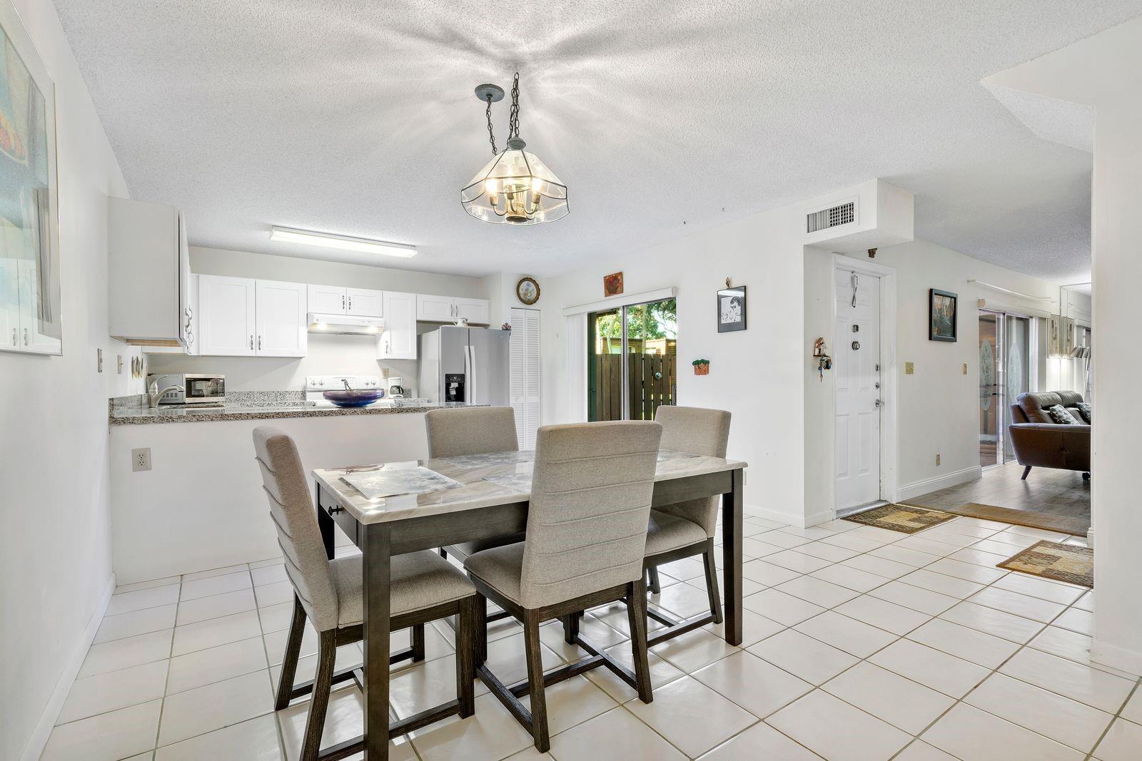 Location, Location, Location! Just minutes from Nova University, major highways, and shopping. This spacious 2 bed, 2.5 bath townhouse in the desirable Patio Homes of Pine Island Ridge can be rented immediately after purchase—great for investors or end users! Enjoy a large owner’s suite with walk-in closet and a second bedroom with its own private bath. Eat-in kitchen, convenient half bath, and laundry located downstairs. Don’t miss this opportunity in a prime Davie location! Buyers need a 720 Credit score or higher to qualify.