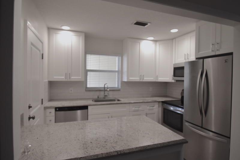 Spacious updated 2/2 condo with full size washer and dryer. Steps to community pool, close to I-95 & Turnpike, malls, restaurants and minutes from the beach. Extra storage closet on porch. New flooring in bedrooms! No carpet! Impact windows and doors!