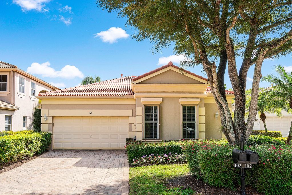 Photo of 103 Sunset Cove Lane, Palm Beach Gardens, FL 33418 (MLS # R11167708)