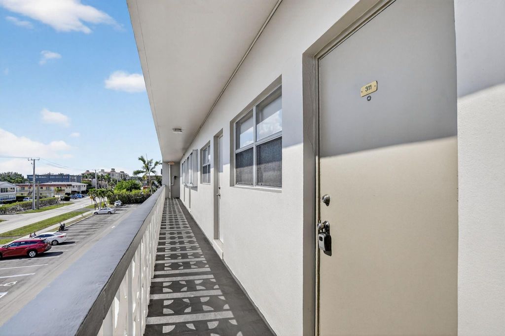 Photo of 941 Crystal Lake Drive #311, Deerfield Beach, FL 33064 (MLS # F10548653)