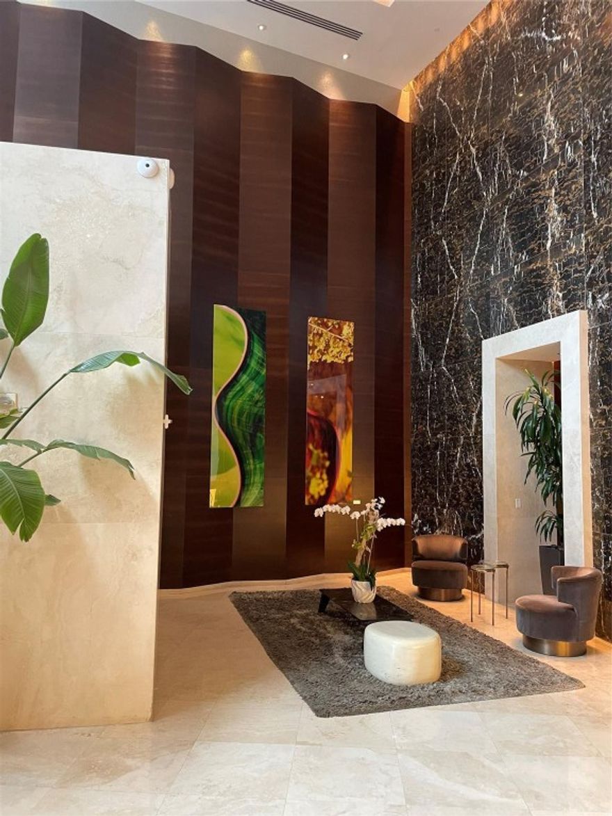 This is the legal 3 Beds & 3.5 Baths, Unit at Trump Tower 1 is located directly on the Beach in Sunny Isles, Floor to -ceiling glass doors  offering endless views of the beach, Intracoastal and City. Unit boasts almost 2000 SQ-FT of interior space, two private terraces and a private elevator. Full service amenities include; Restaurant for residents with room service, 24 hour concierge, pool and bar attendees, club room, spa, gym, conference room, valet parking much more. Close proximity to shopping like Aventura Mall and BAL Harbor Shops.