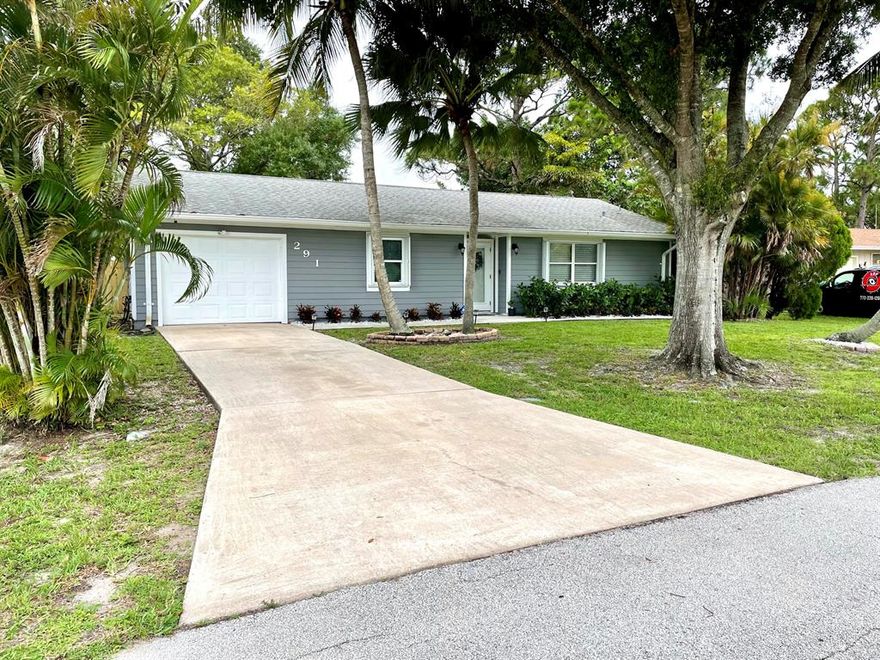 Beautiful 2/2 updated home on oversize lot. SS appliances, granite countertops. Brand new floors thru out. Remodeled both bathrooms. Keyless entry, nest and ADT system. Accordion hurricane shutters. Fenced in backyard and plenty of room for a pool. Screened in patio. Bring your boat to the free ramp in neighborhood.