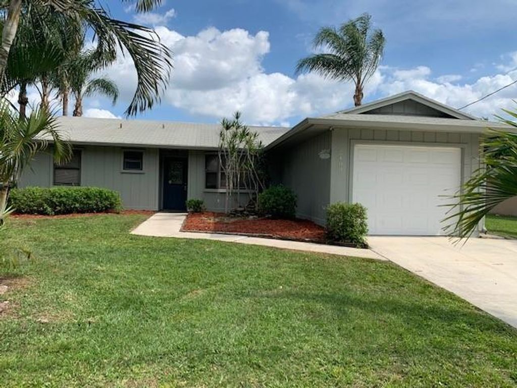 Photo of 2489 SE Westmoreland Boulevard, Port Saint Lucie, FL 34952 (MLS # R10713031)