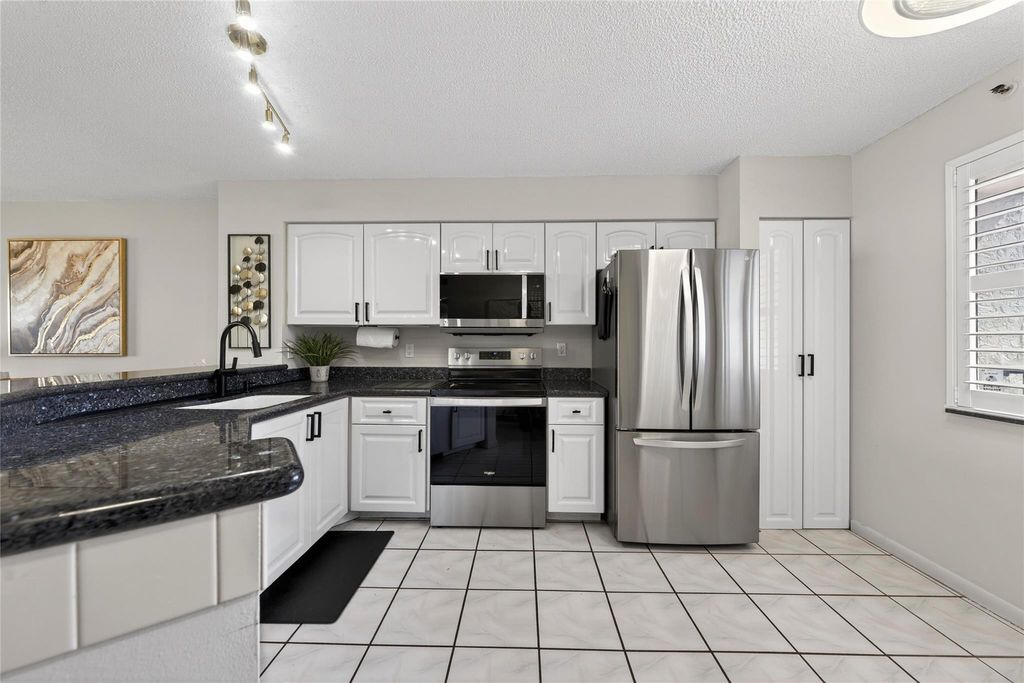 Photo of 2215 Cypress Island Drive #701, Pompano Beach, FL 33069 (MLS # F10550933)