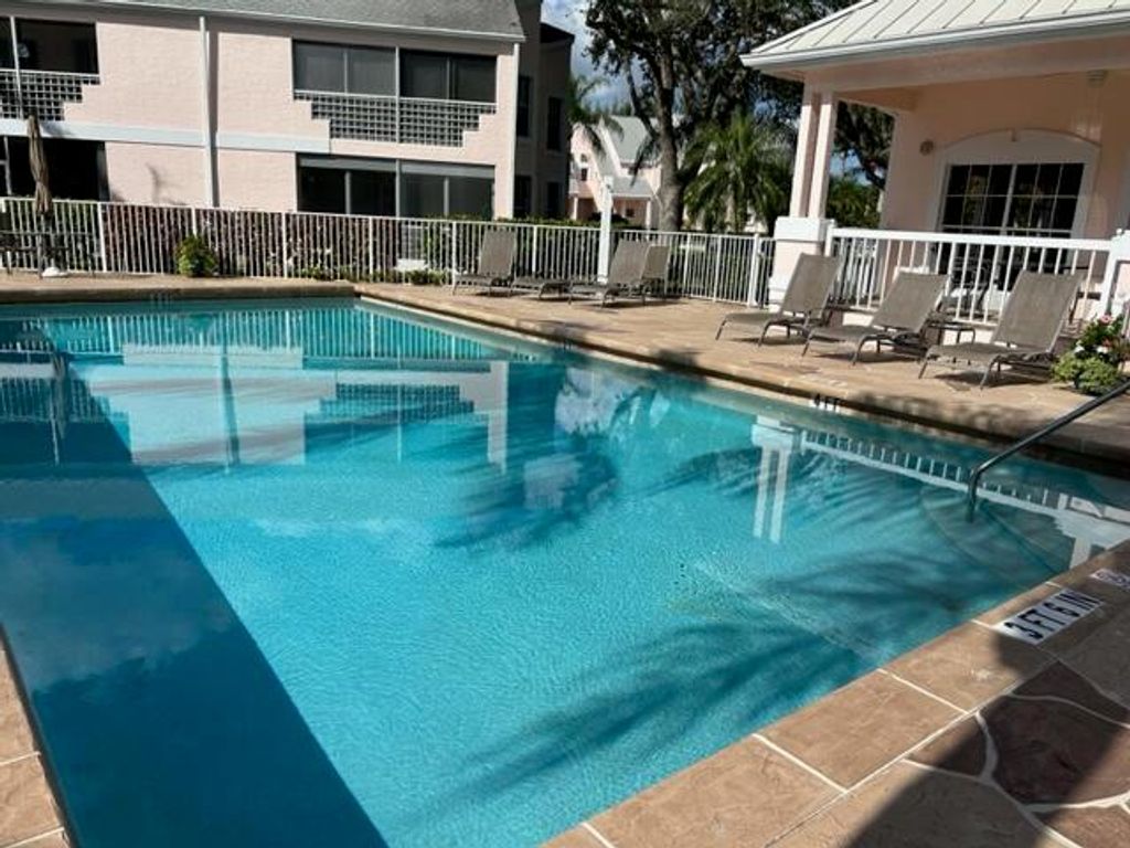 Photo of 702 Muirfield Court #D, Jupiter, FL 33458 (MLS # R10877353)