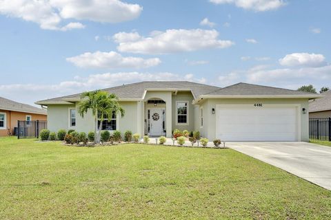 Photo of 4481 SW Hagaplan Street, Port Saint Lucie, FL 34953 (MLS # R11107883)