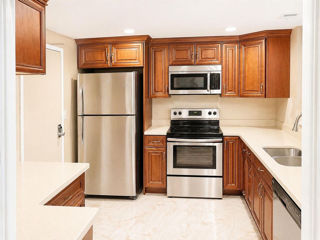 Photo of 10777 W Sample Road #312, Coral Springs, FL 33065 (MLS # B26020911)