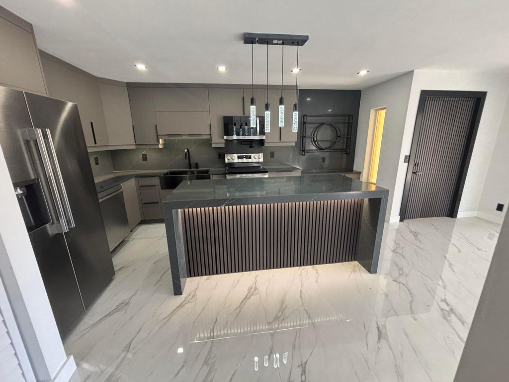 Photo of 4695 Sable Pine Circle #C2, West Palm Beach, FL 33417 (MLS # B26032559)