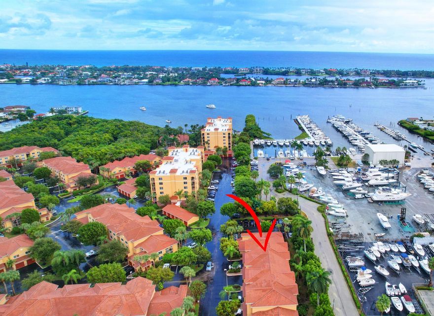 New Roof 2023! Remodeled 3 bed 2 bath plus 1 car garage * Intracoastal * gated community! Top floor condo all one level once inside, garage directly downstairs & private driveway. Remodeled kitchen, granite counters, extended bar & stainless appliances! Diagonal tile throughout, split bedroom floor plan. Large tiled master bed, walk in closet, dual vessel sinks & granite vanity. Full size washer & dryer inside. Covered balcony overlooks palms & marina. Resort style intracoastal clubhouse, pool, spa, full gym, cardio, billiards, sauna, bbq, private beach & tikis! Onsite mgt. Palm Beach yacht center marina borders property, offers boat club & charters! HOA dues include  amenities, ext insurance & water! Kayak racks available for add fee. Ok to lease. All ages & Pet friendly! Great location!