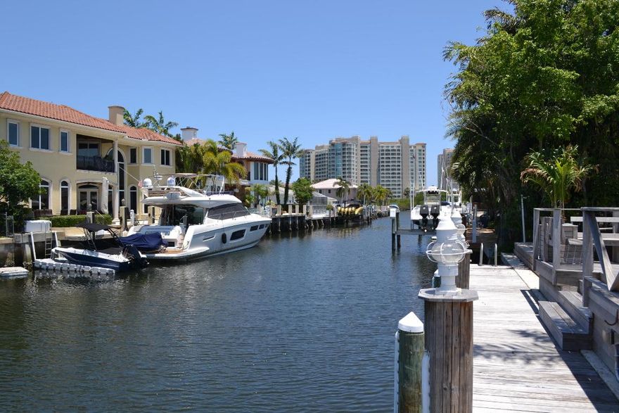 WOW! GORGEOUS REMODELED ONE-STORY HOME!  East Boca’s Bel-Marra Community with Intracostal Ocean Access, No Fixed Bridges, Magnificent Deep Water Canal, 85’ Waterfront Private Dock, Diamond Bright Pool with Extended Deck & Patio!  Boasts Gourmet Kitchen, Wolf 6 Burner Gas Stove, Granite Counters, S/S Appliances, Back-splash & Center Island!  Raves Oak Wood Floors, Crown Moldings, French Doors, Hurricane Windows & Doors! Special Features: NO HOA FEE, Water Filtration/Softener System & Security Alarm System. GREAT LOCATION:  Minutes to Beach, Florida Atlantic University, Downtown Mizner Park, Popular Atlantic Ave Delray Beach, Shopping Mall & Interstate-95, A-Rated Schools and Pet Friendly!