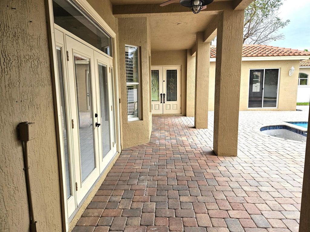 Photo of 6635 Houlton Circle, Lake Worth, FL 33467 (MLS # R10969838)