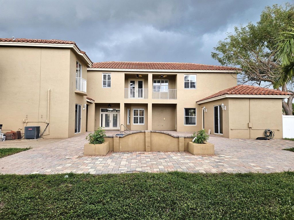 Photo of 6635 Houlton Circle, Lake Worth, FL 33467 (MLS # R10969838)