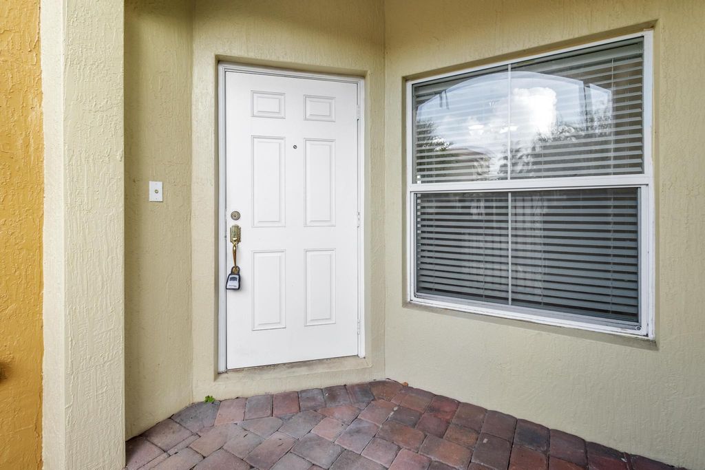 Photo of 322 Lake Monterey Circle, Boynton Beach, FL 33426 (MLS # R11058604)