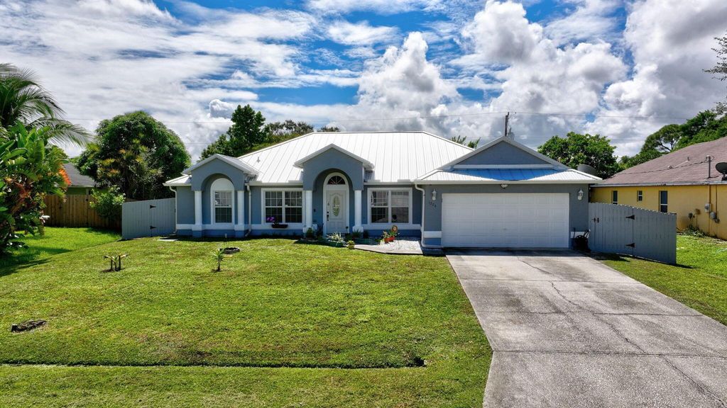 Photo of 1226 SW San Antonio Avenue, Port Saint Lucie, FL 34953 (MLS # R11090914)