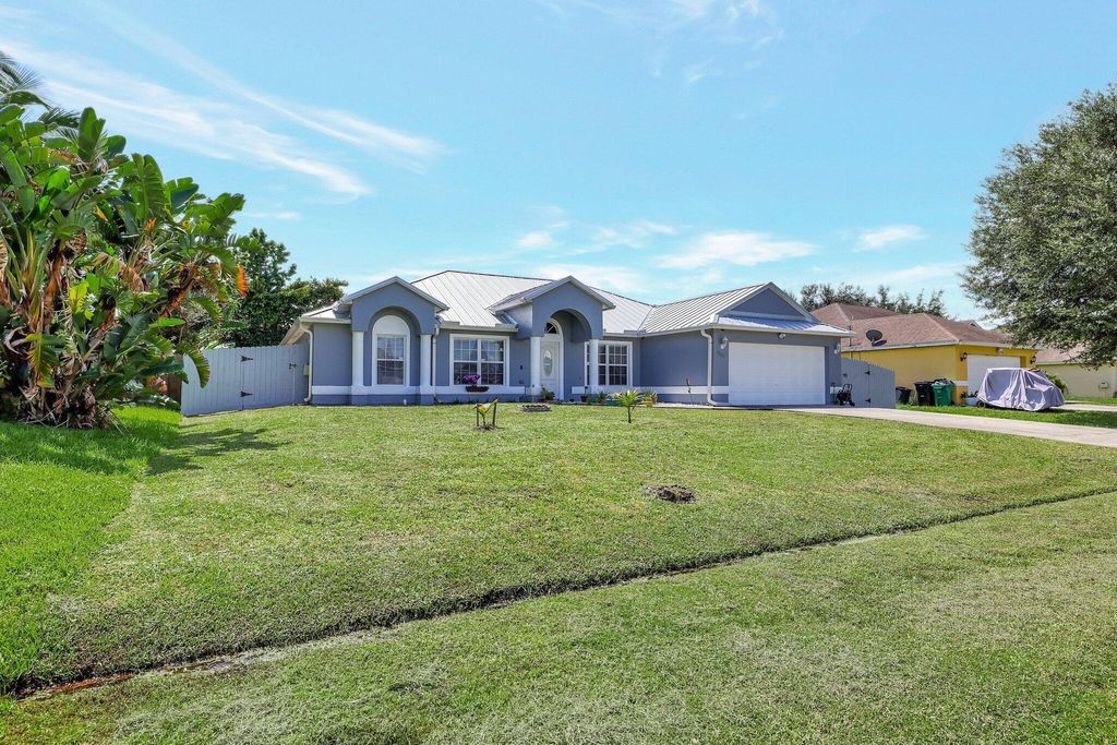 Photo of 1226 SW San Antonio Avenue, Port Saint Lucie, FL 34953 (MLS # R11090914)