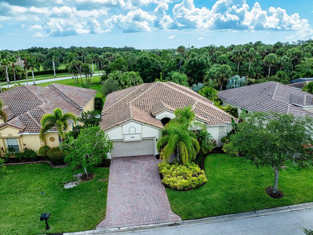Photo of 11206 SW Apple Blossom Trail, Port Saint Lucie, FL 34987 (MLS # B26027303)