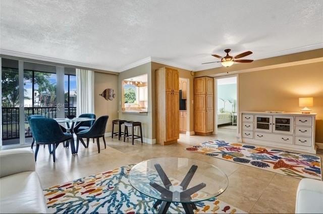 Welcome to your beautifully remodeled & furnished condo, located in the prestigious community of Hillsboro Beach. Situated in desirable Port De Mer—stretching from the Intracoastal Waterway to a private beach—this well-managed & meticulously maintained community offers 2 heated pools & convenient guest parking.
This first-floor unit features a spacious open layout with two generously sized primary suites, each offering its own full bathroom and large closet. Just off the kitchen, a screened-in patio provides a peaceful outdoor space for dining or relaxing.
Assigned covered parking located right next to the elevator, extra storage, and prime location within walking distance of restaurants, shops, and the Deerfield Beach Pier. Building has recently completed its 50-year certification.