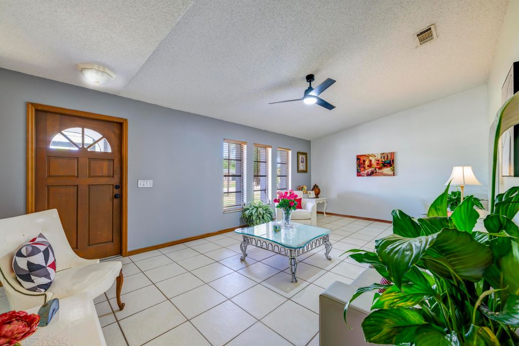 Photo of 1216 SE Petunia Avenue, Port Saint Lucie, FL 34952 (MLS # R11086048)