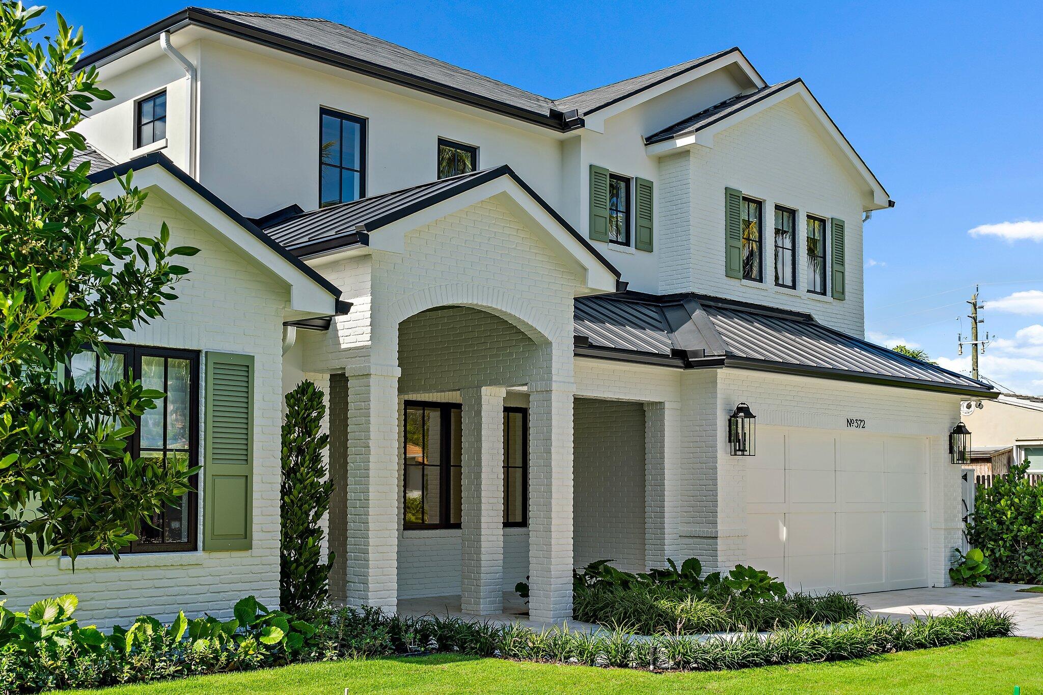 Introducing 372 Macy Street, a custom built 4 bedroom, 4.5 bath home nestled on a tree lined street East of Dixie and only a short walk to the Intracoastal Waterway in the highly desirable Soso district. Crafted with meticulous attention to detail, this dream oasis boasts high end finishes and luxurious touches throughout. Step into the heart of the home, where you will be enamored with the custom kitchen cabinetry by WoodStile Palm Beach, state of the art appliances, and ample space for entertaining. The spacious living areas are adorned with wood floors and custom millwork bringing warmth and elegance to the space. The first floor primary suite offers tons of closet space and a luxurious, oversized bathroom. A dedicated office or den is also conveniently located on the first floor.