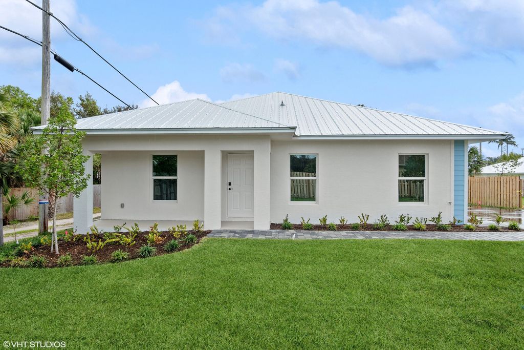 Photo of 2134 NE Arch Street, Jensen Beach, FL 34957 (MLS # R10967148)