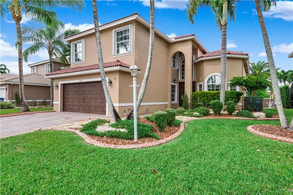 Photo of 4754 NW 120th Dr, Coral Springs, FL 33076 (MLS # F10311757)