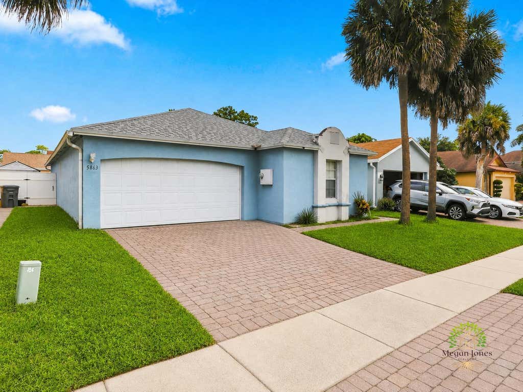 Photo of 5863 AZALEA Circle, West Palm Beach, FL 33415 (MLS # B26061829)