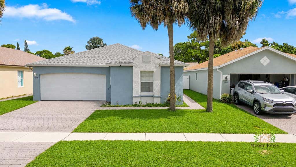 Photo of 5863 AZALEA Circle, West Palm Beach, FL 33415 (MLS # B26061829)