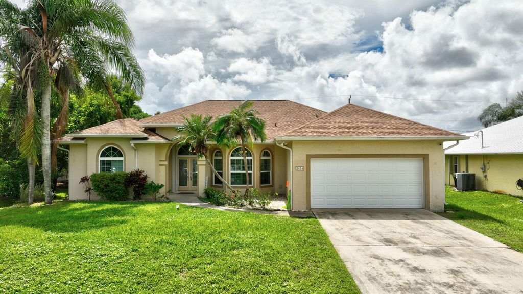 Photo of 2820 SE Tate Avenue, Port Saint Lucie, FL 34984 (MLS # R11125365)