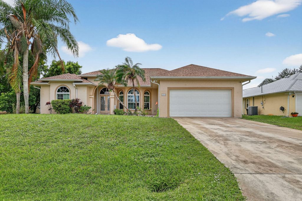 Photo of 2820 SE Tate Avenue, Port Saint Lucie, FL 34984 (MLS # R11125365)