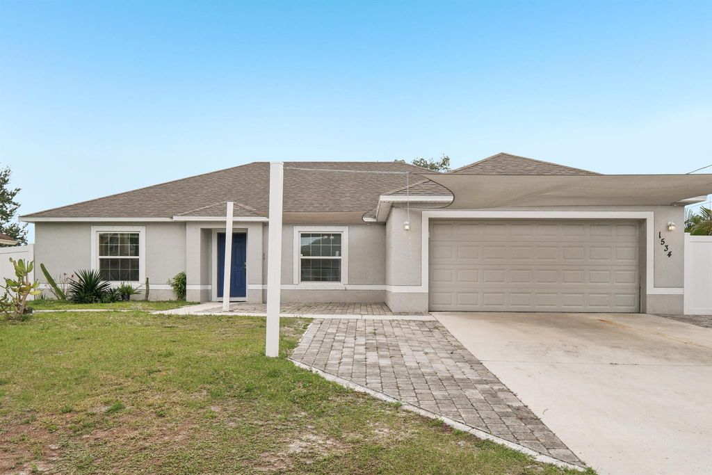Photo of 1534 SW Jacksonville Avenue, Port Saint Lucie, FL 34953 (MLS # R11076780)