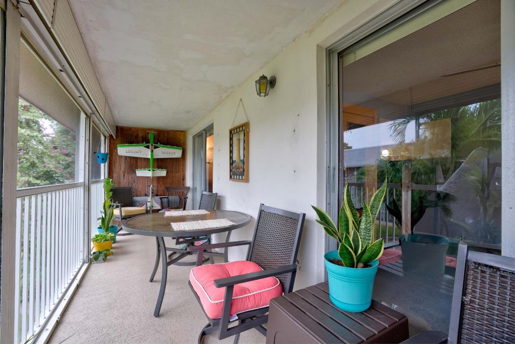 Photo of 18081 SE Country Club Drive #9-89, Tequesta, FL 33469 (MLS # R10951654)