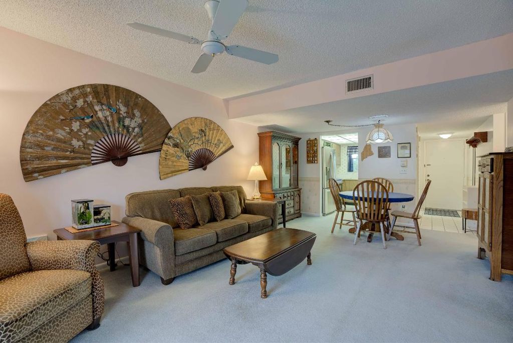 Photo of 18081 SE Country Club Drive #9-89, Tequesta, FL 33469 (MLS # R10951654)