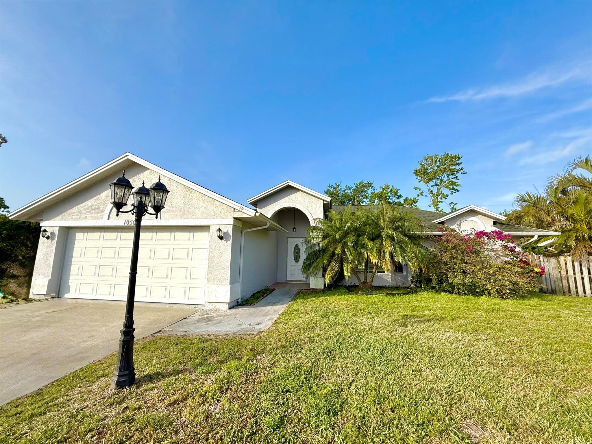 3 bedroom, 2 bathroom, 2 car garage with LARGE fenced in back yard and screened in lanai . Pet friendly with no HOA and relaxed leasing requirements