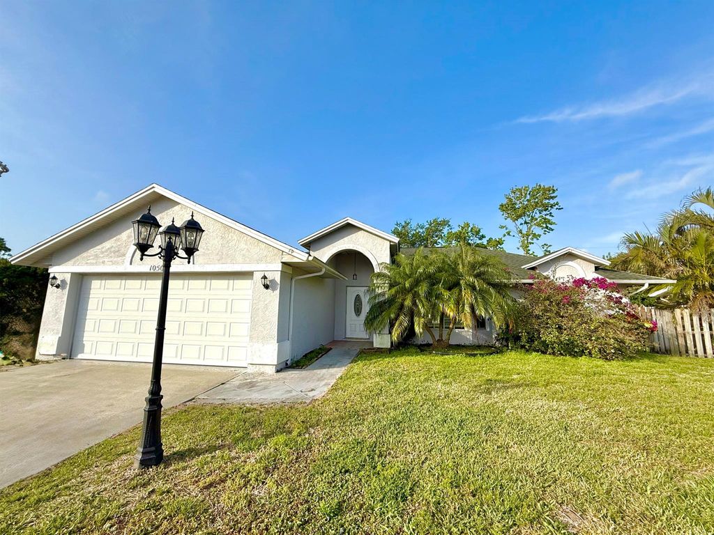 Photo of 1050 SE Euclid Lane, Port Saint Lucie, FL 34983 (MLS # R11068283)