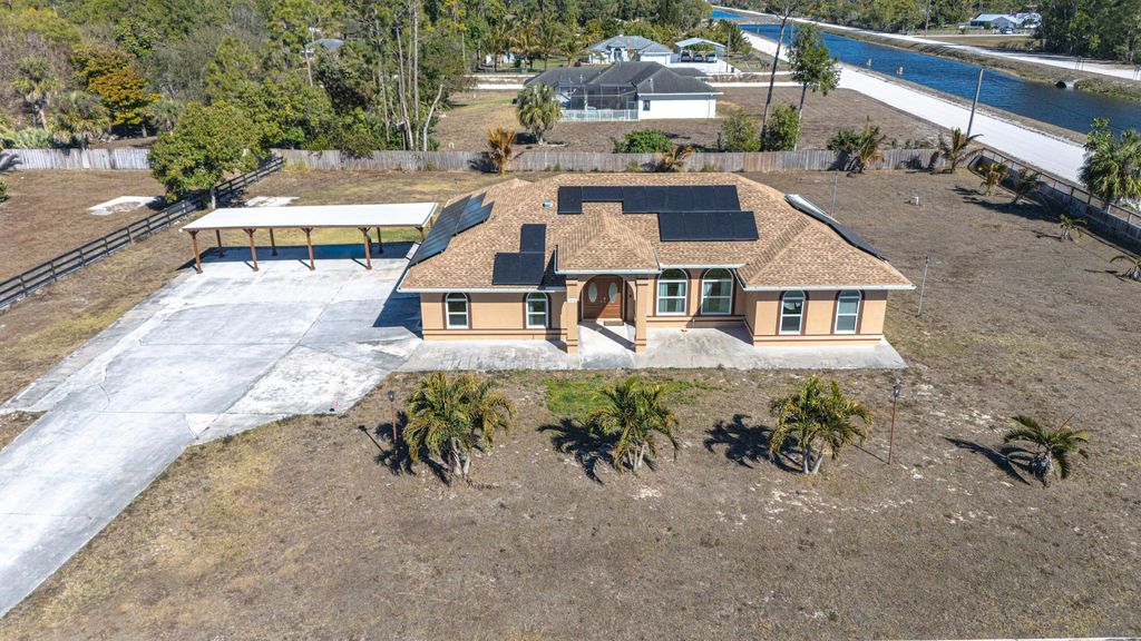 Photo of 13035 61st Lane N, The Acreage, FL 33412 (MLS # R11160433)