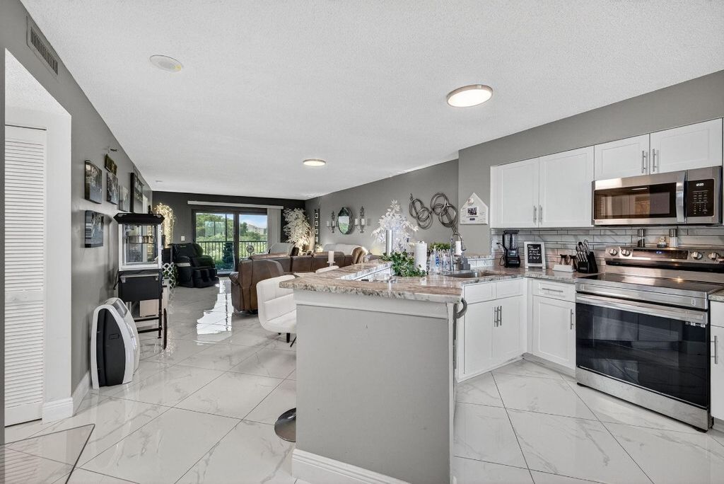 Photo of 2334 S Cypress Bend Drive #511, Pompano Beach, FL 33069 (MLS # F10516111)