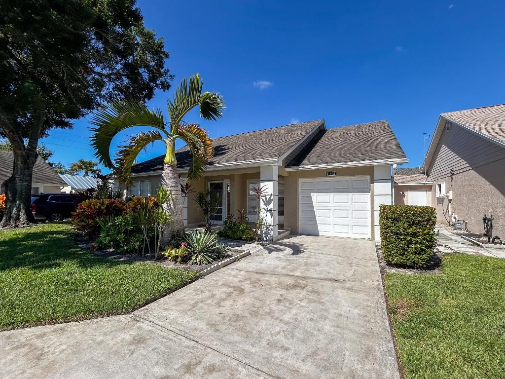 Photo of 312 NW Tuscany Lane, Port Saint Lucie, FL 34986 (MLS # R11124882)