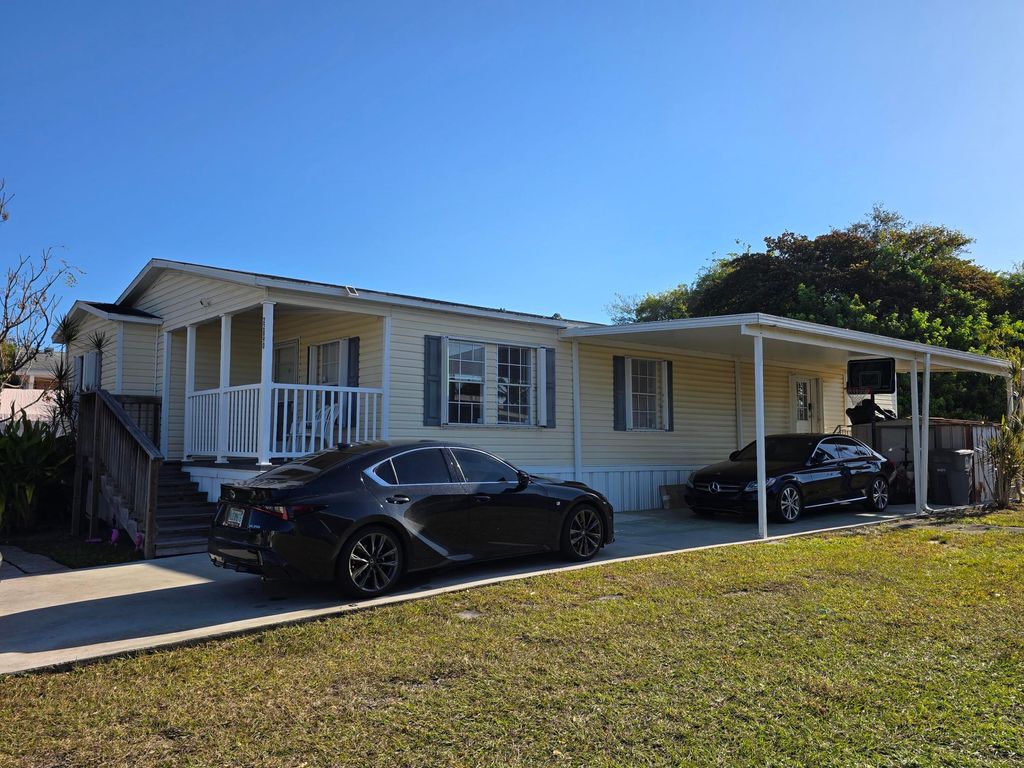 Photo of 22890 Neptune Road, Boca Raton, FL 33428 (MLS # B26015641)