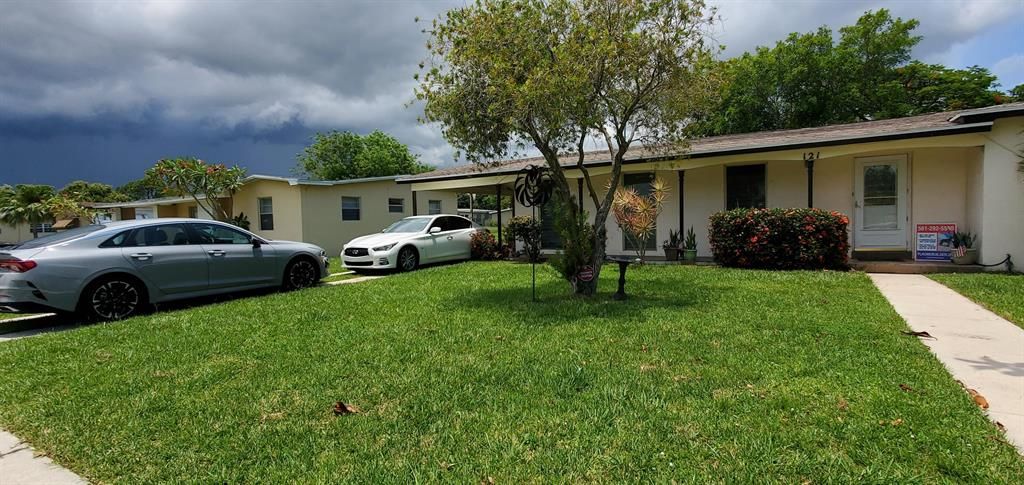 Photo of 121 Banyan Drive, Port Saint Lucie, FL 34952 (MLS # R10807891)