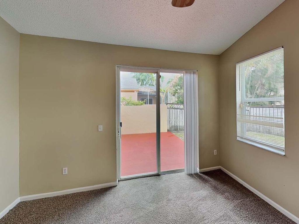 Photo of 6119 Oak Bluff Way, Lake Worth, FL 33467 (MLS # B26006332)