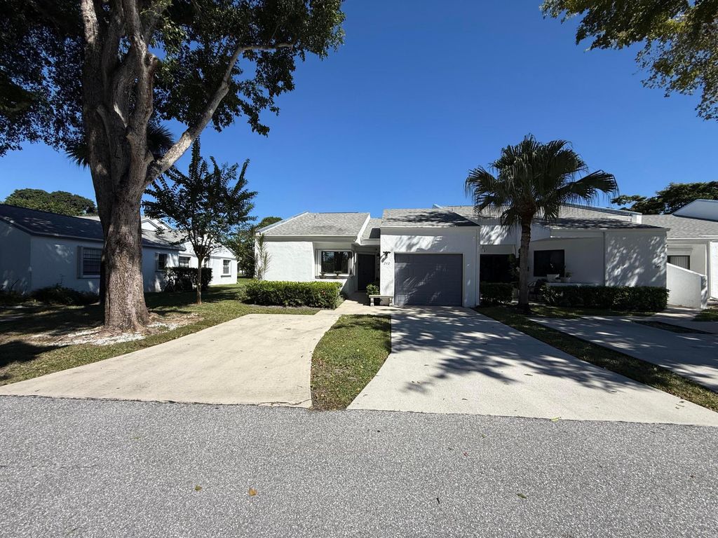 Photo of 242 Par Drive, Royal Palm Beach, FL 33411 (MLS # R11136337)